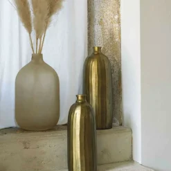 BLANC D'IVOIRE - Vase bouteille soliflore strié doré aluminium 15x41cm