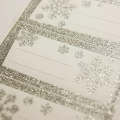 GLOBAL GIFT - 12 étiquettes adhésives de noël - flocons argentés à paillettes